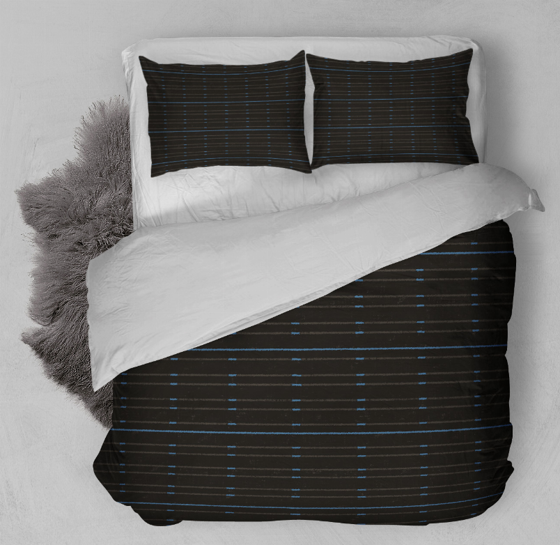 Black duvet cover set with blue horizontal stripes and two matching pillow shams, close view