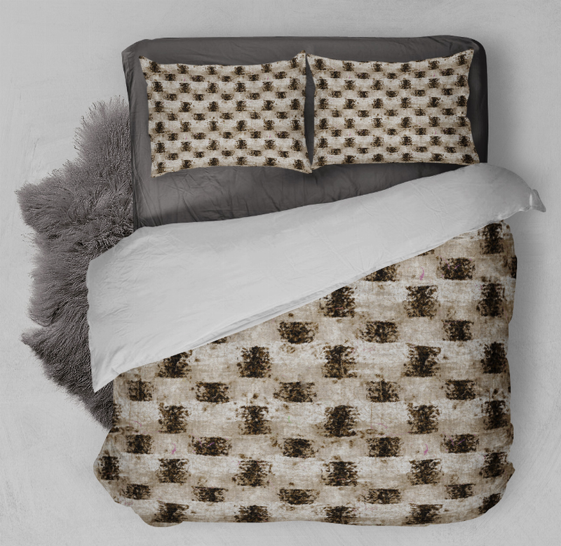 Comforter set with dark paw-print comforter and two matching pillows