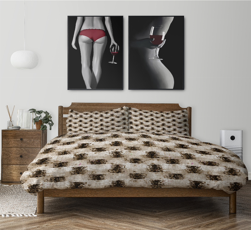 Comforter set with brown-and-black paw-print design and two matching pillows