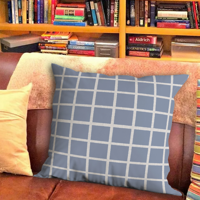 Square blue and gray check grid throw pillow with white intersecting lines