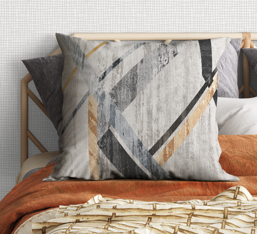 Large square throw pillow with textured light-gray fabric, gray X design, black lines, gold accent