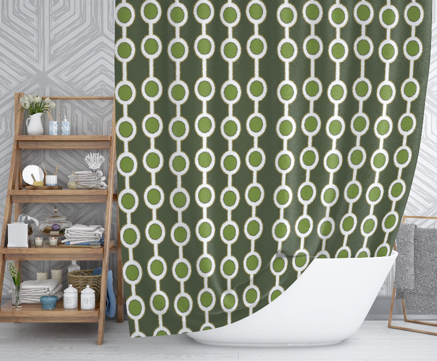 Shower curtain with repeating green and white ring pattern on dark gray fabric