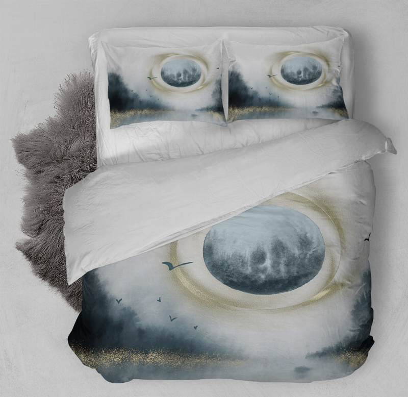 Blue and white comforter set with two pillow shams featuring oval print detail