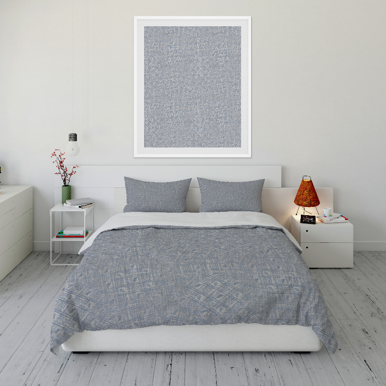Blue patterned duvet cover set with matching pillow shams, shown on a bed