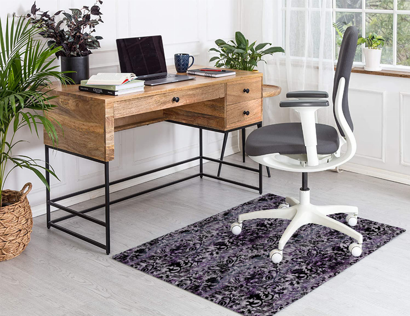 Low-pile rectangular purple damask patterned area rug