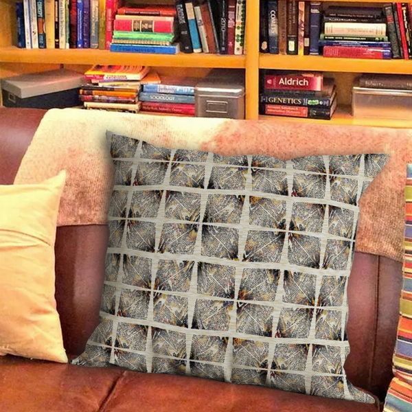 Multi-pattern throw pillow with repeating geometric block design in black and tan