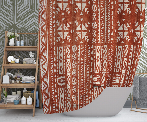 Rust-brown shower curtain with beige tribal pattern beside bathtub