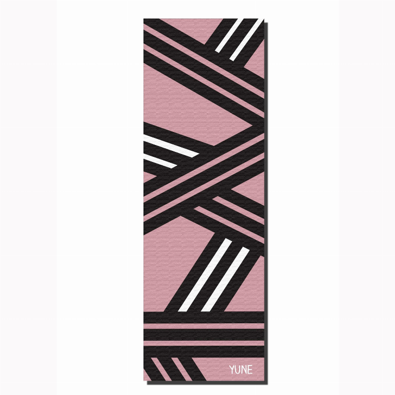 Yoga mat with pink and black abstract stripe pattern, YUNE logo at bottom