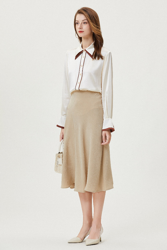 Cream silk button-up shirt with brown-trim collar and button cuffs