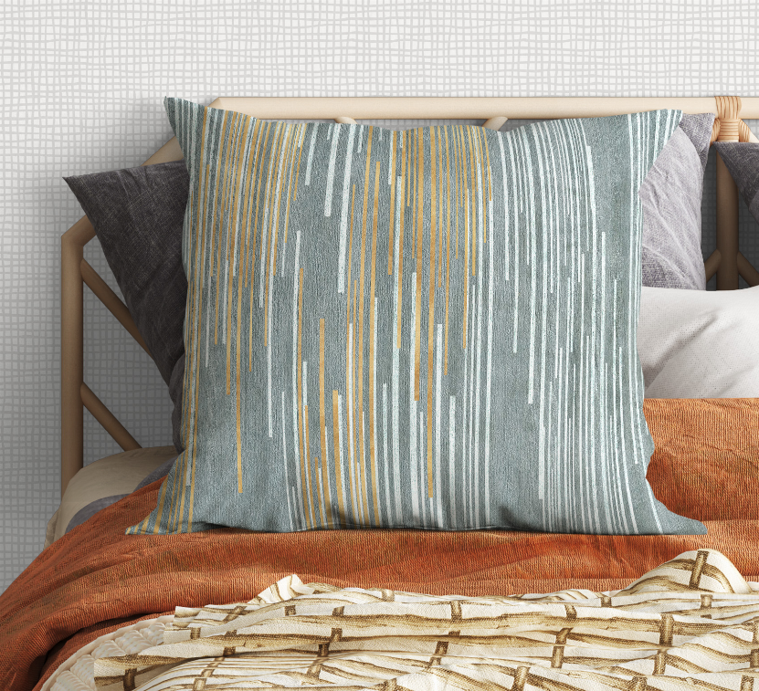 Square decorative pillow with teal fabric and vertical stripe pattern in gold and light gray