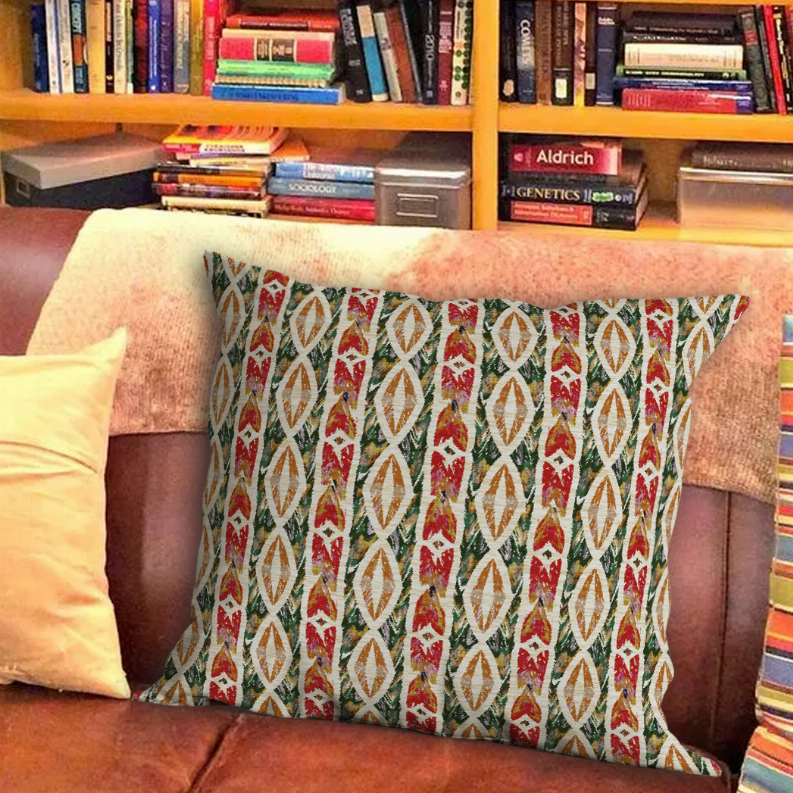 Throw pillow cover featuring red and green geometric repeat pattern on cream