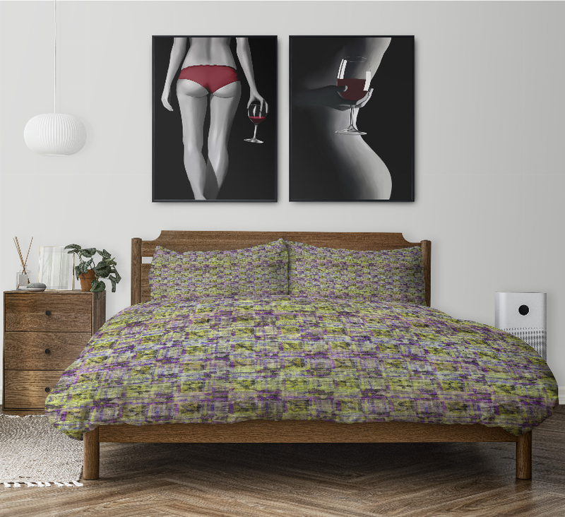 Multicolor patterned comforter set with two pillow shams on a wooden bed