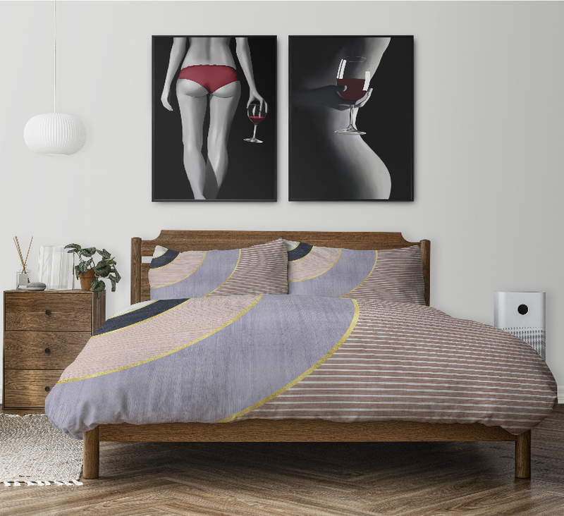 Comforter set with gray, white, and yellow curved stripes on duvet and matching pillow shams.