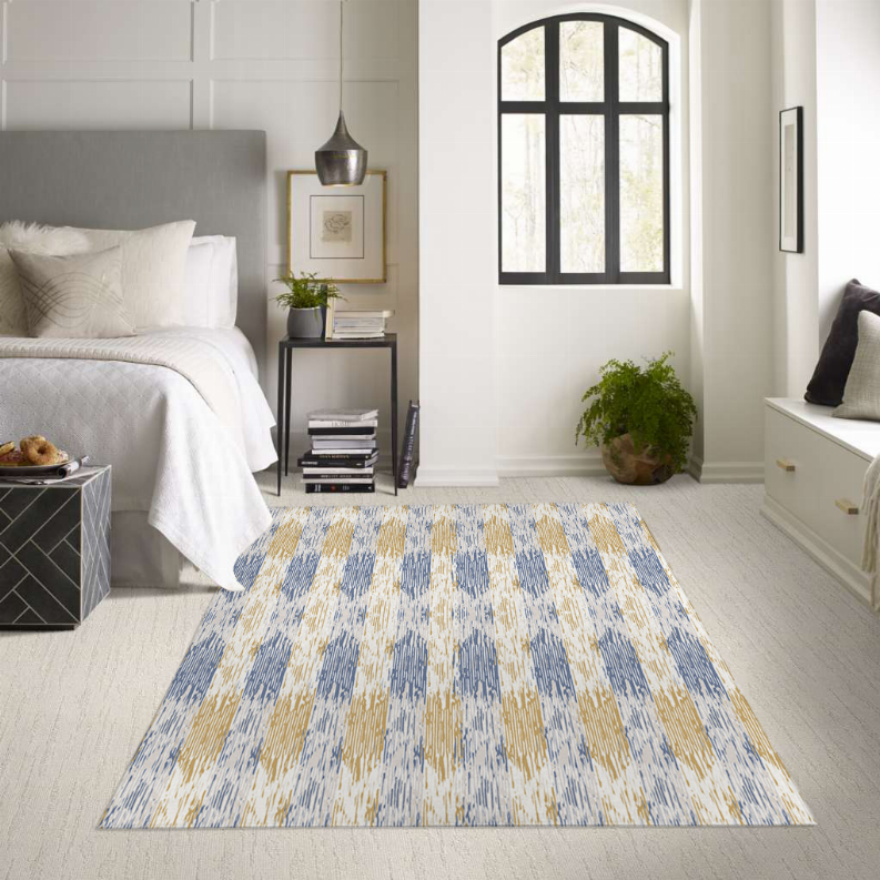 Low pile area rug, rectangular abstract blue and gold stripes with mottled texture