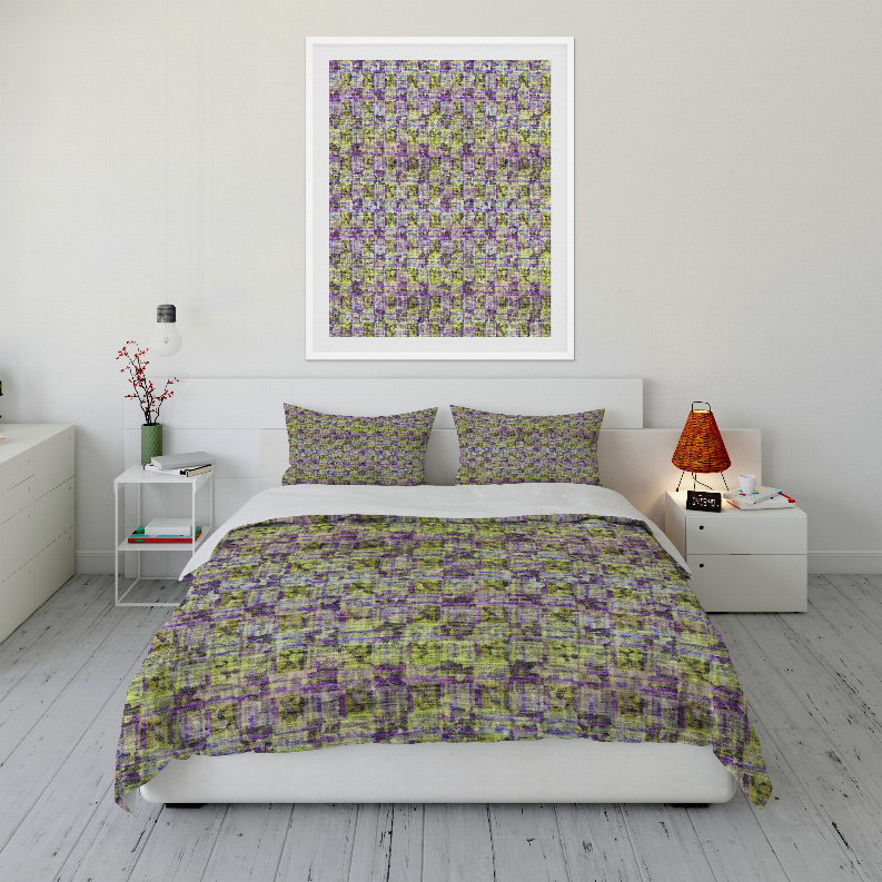 Multicolor comforter set with two pillow shams and comforter on bed