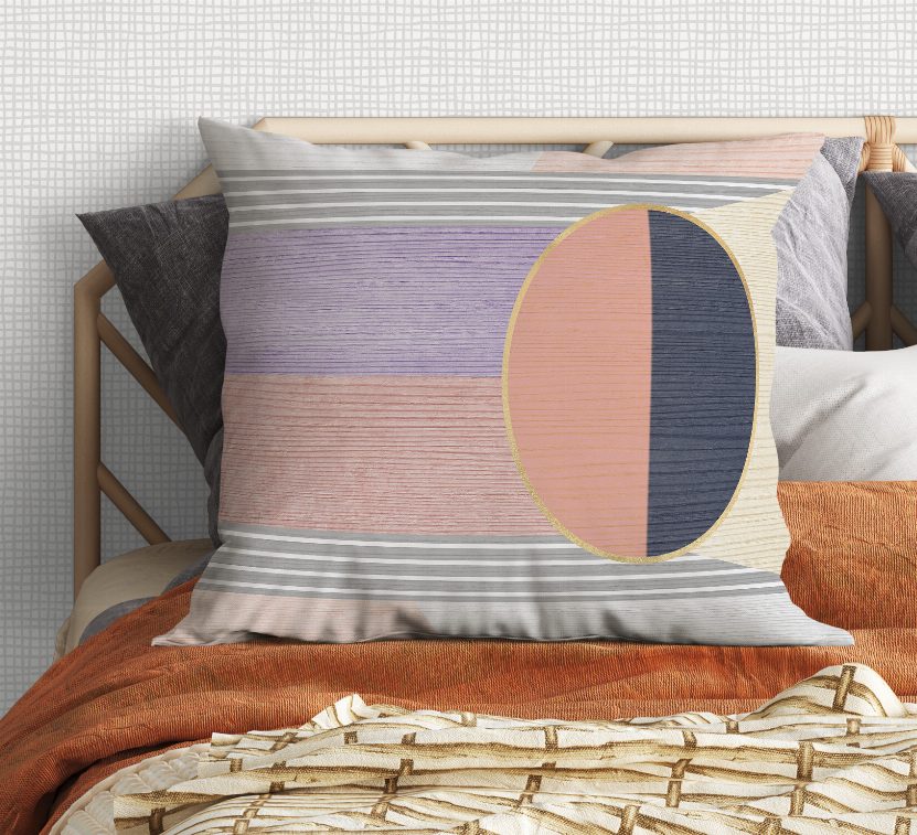 Abstract oval graphic multi-striped pillow in navy, peach, cream, and gray