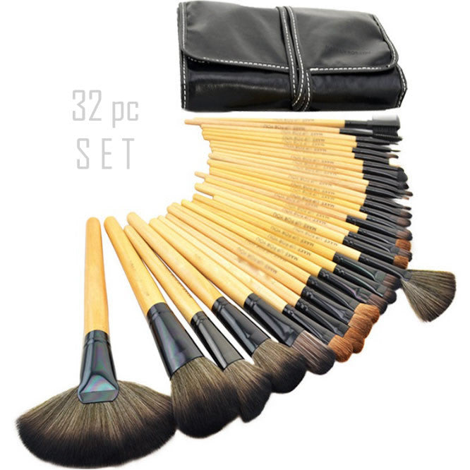 Sculptor wooden makeup brush set fanned out with black bristles, black zip pouch