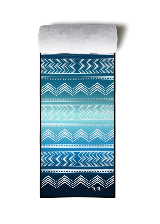Yoga towel with teal aqua and navy chevron stripes, rolled top