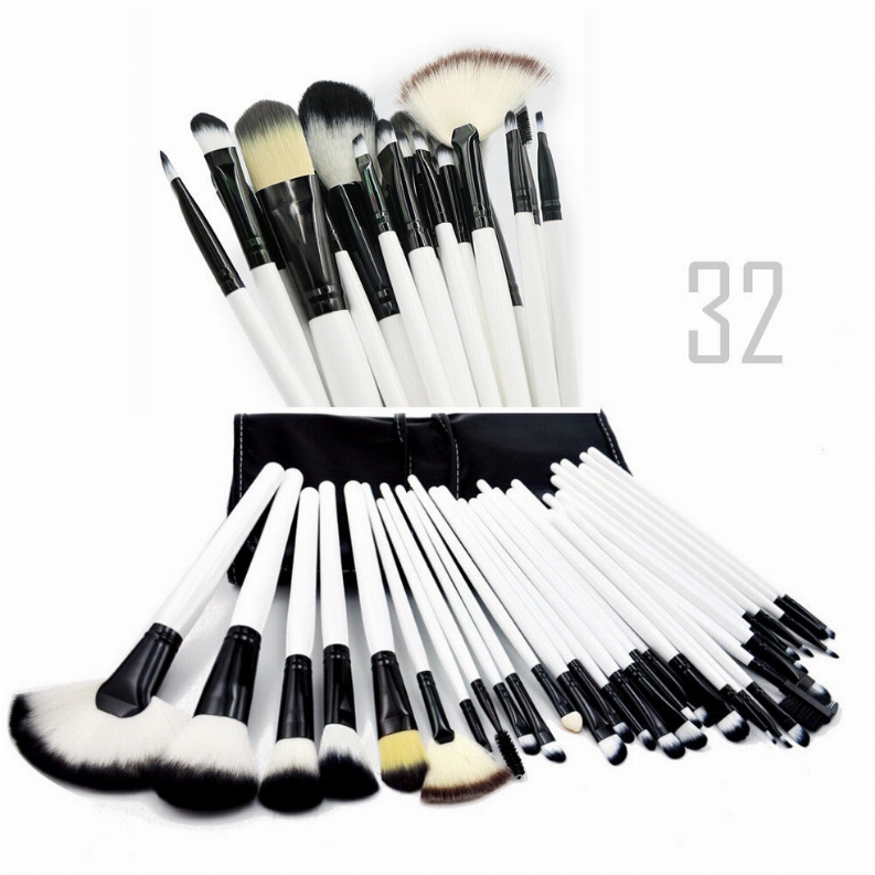 Makeup brush set with 32 brushes, black-and-white handles, assorted fluffy bristle heads