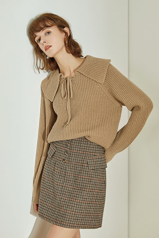 Checked mini skirt with button placket and straight mini hem