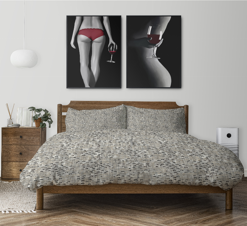 Speckled gray-and-white comforter set with matching pillow shams on bed
