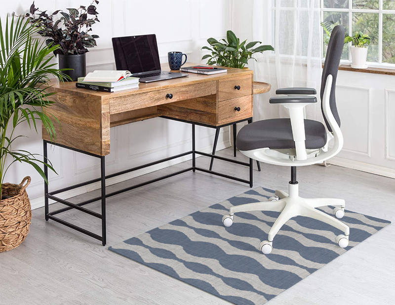 Low pile carpet with blue and white wavy stripes pattern, rectangular