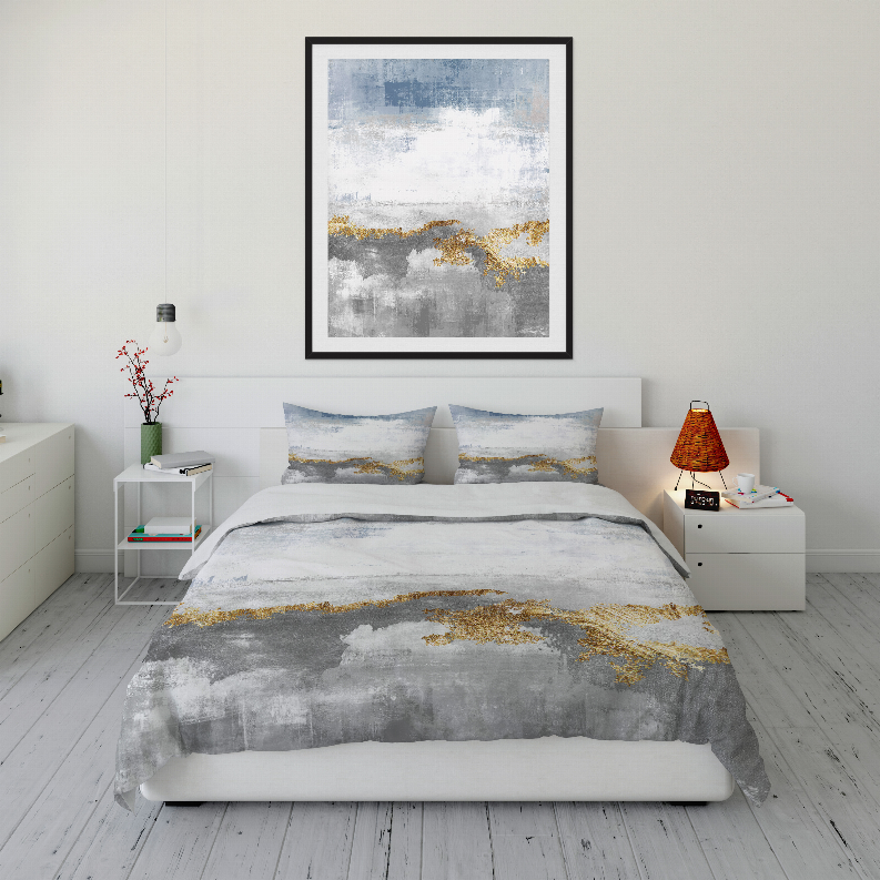 Comforter set and two matching pillow shams with white, blue, and gold abstract stripe.