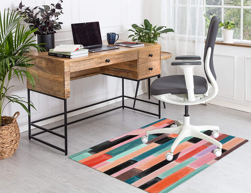 Multicolor low pile carpet with geometric stripe blocks, rectangular rug.