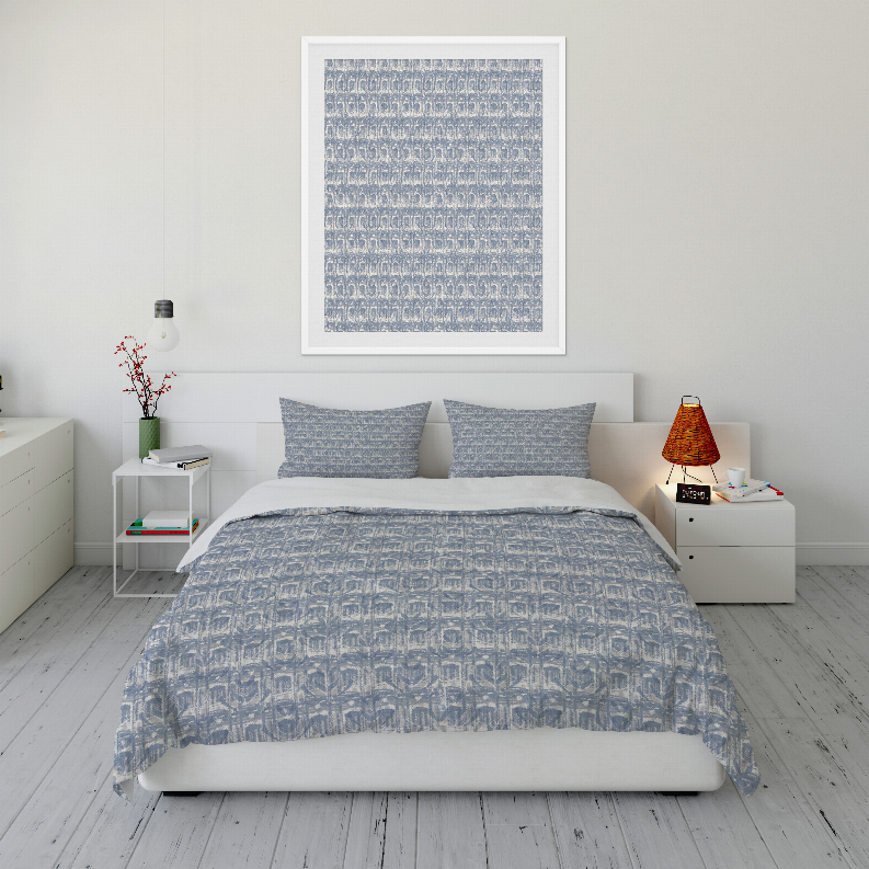 Blue patterned comforter set with two matching square pillow shams