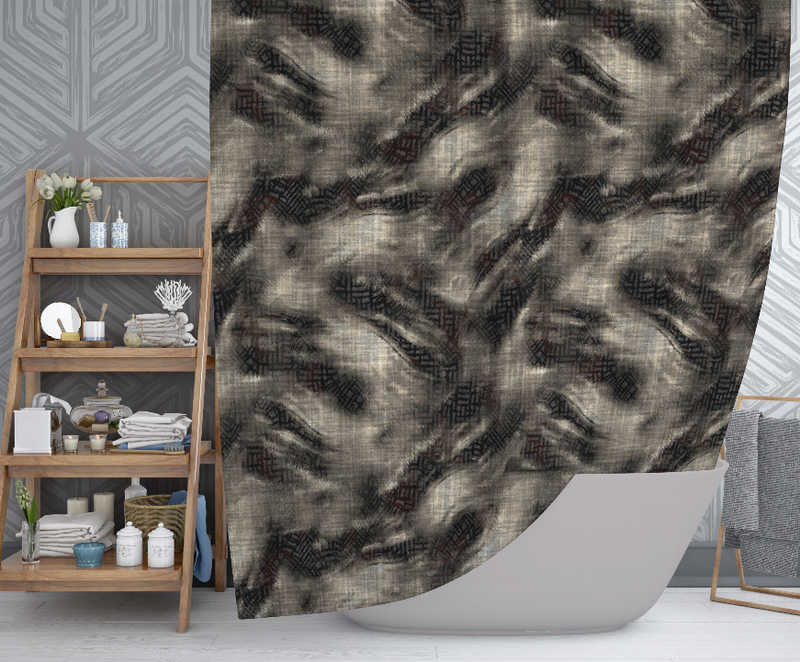 Dark gray abstract shower curtain draped beside a white bathtub in a bathroom
