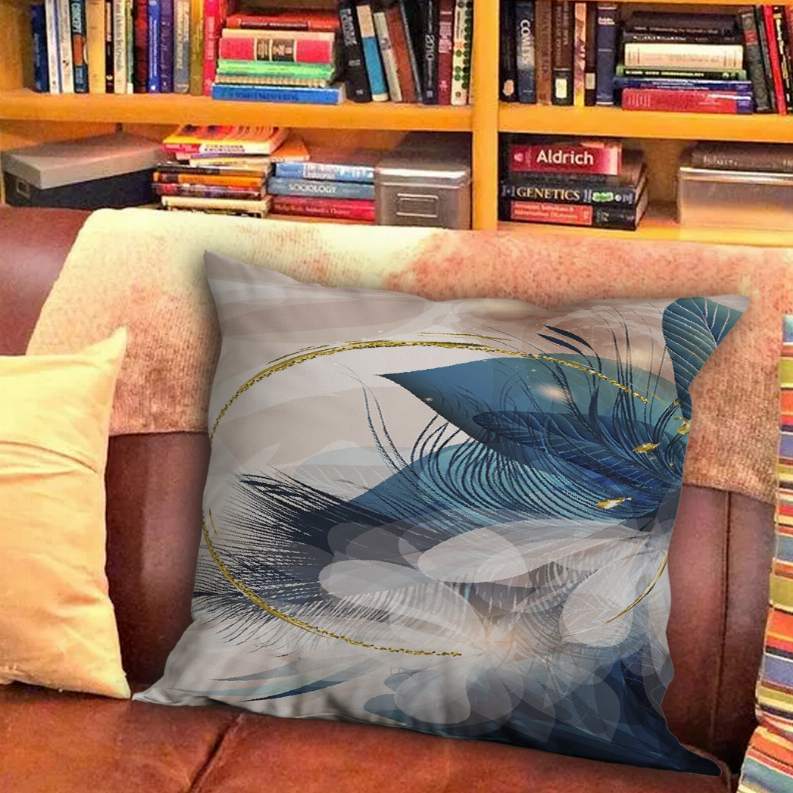 Multi throw pillow with blue and gray feather pattern on beige fabric