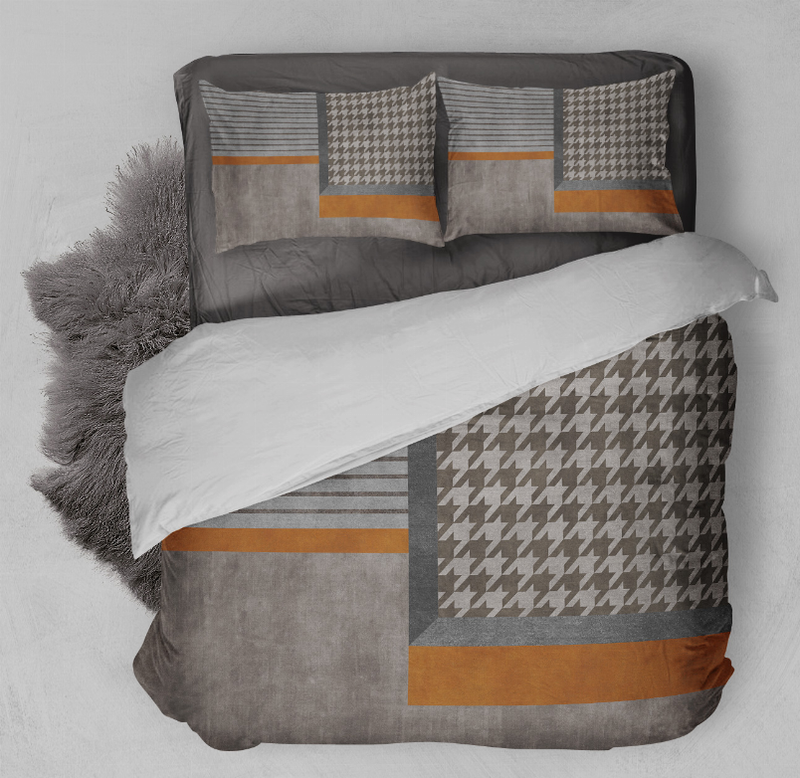 Gray comforter set with houndstooth and striped panels plus orange band accents on pillows