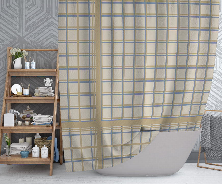 Plaid shower curtain with beige and light blue grid lines, draped over tub