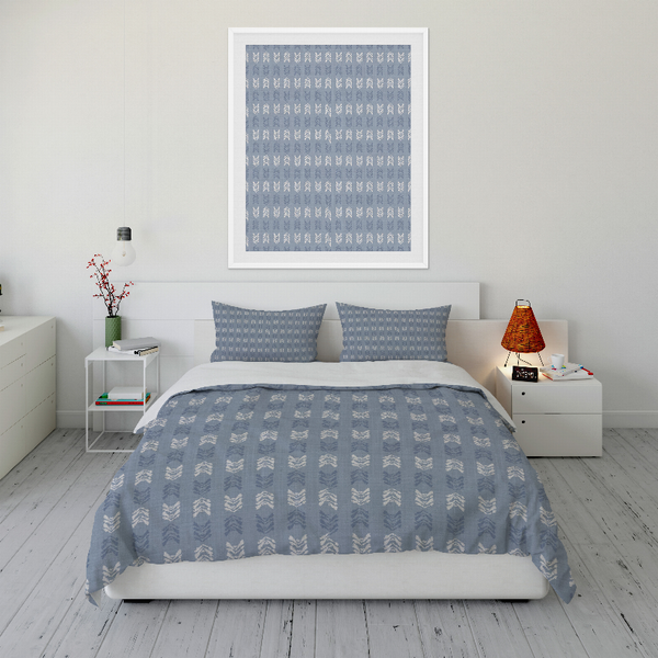 Blue patterned duvet cover set with matching pillow shams, geometric motif
