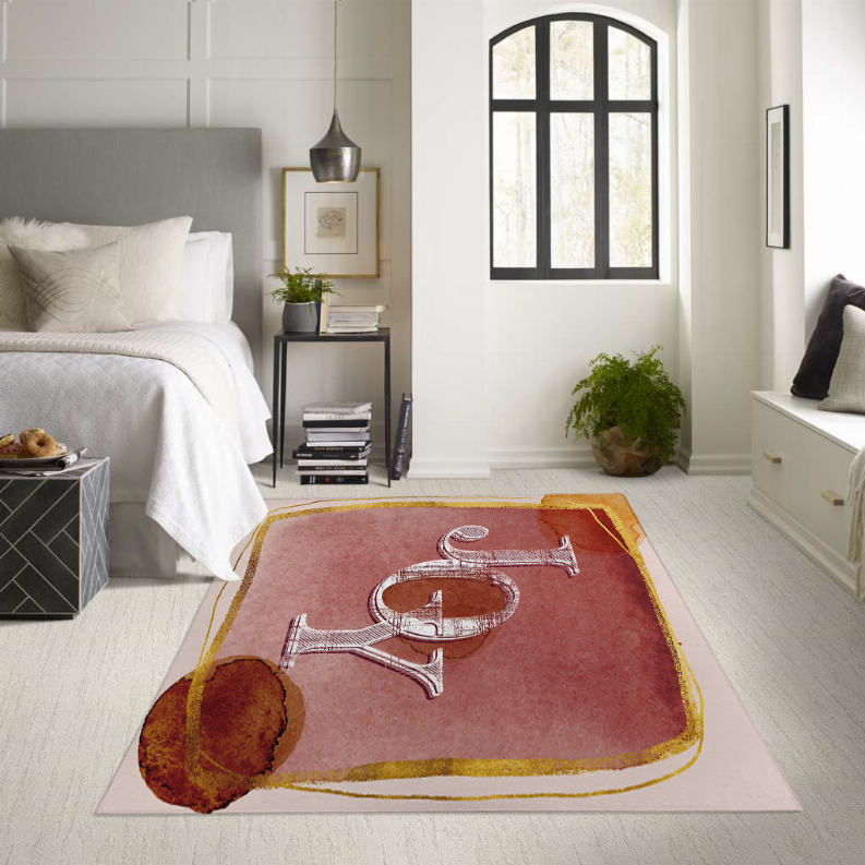 Multi-color low pile carpet with rusty red music-instrument graphic and gold border.