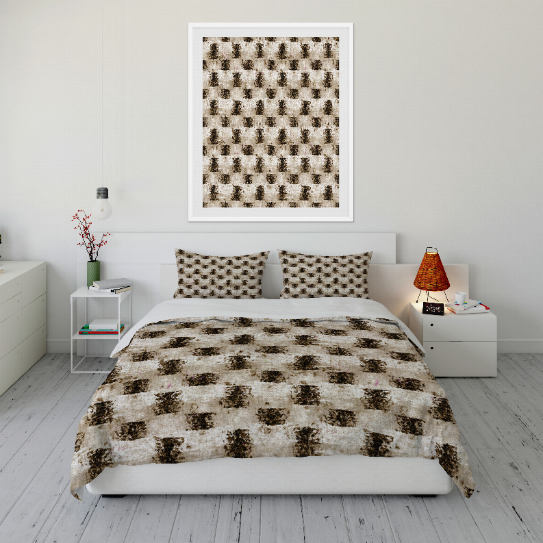 Comforter set with cream-and-brown geometric print, centered on bed with two pillow shams