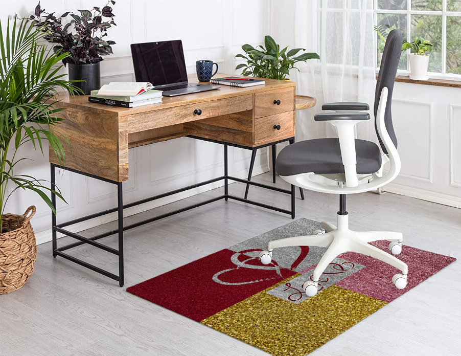 Multicolor low-pile carpet corner with red, gray, gold blocks and heart outline