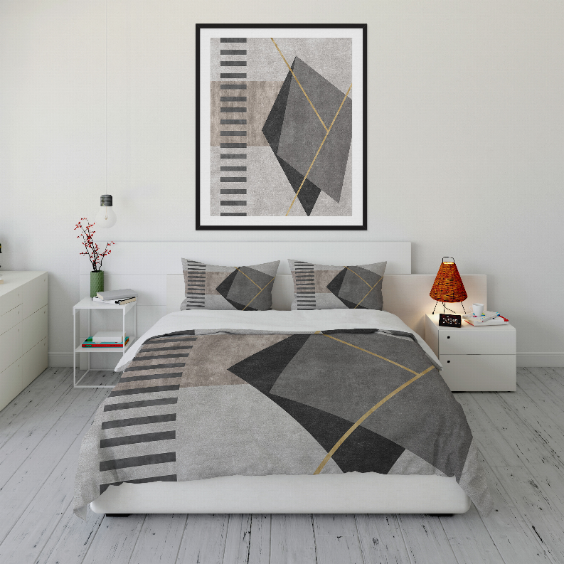 Geometric bedding set: gray comforter with black geometric shapes and yellow-line details