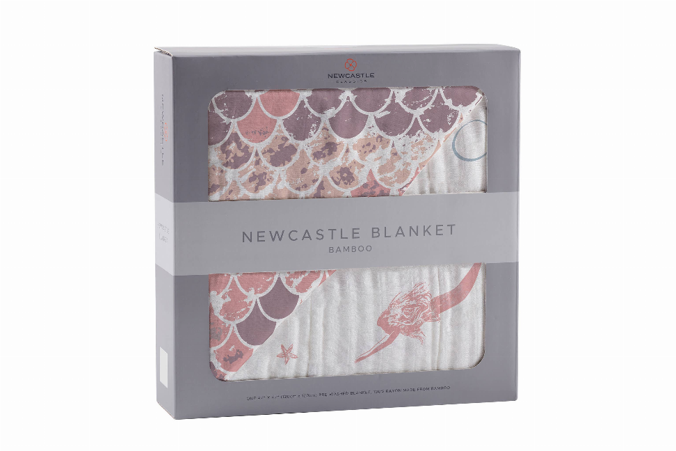 Bamboo blanket in gift box with mauve scales, moon circles, and mermaid print