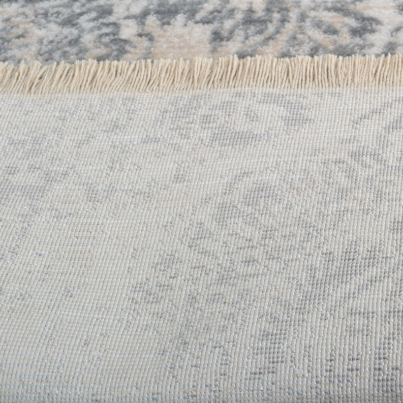 Light blue-gray area rug with crossweave look and textured border fringe detail