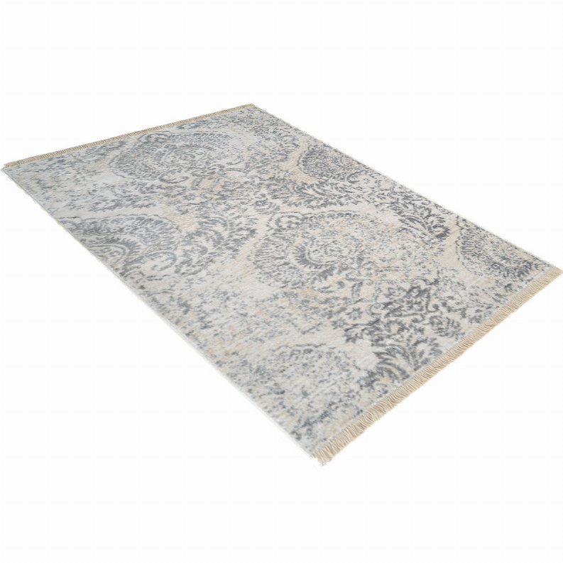 Rectangular area rug in cream and blue-gray with ornate damask pattern and fringe