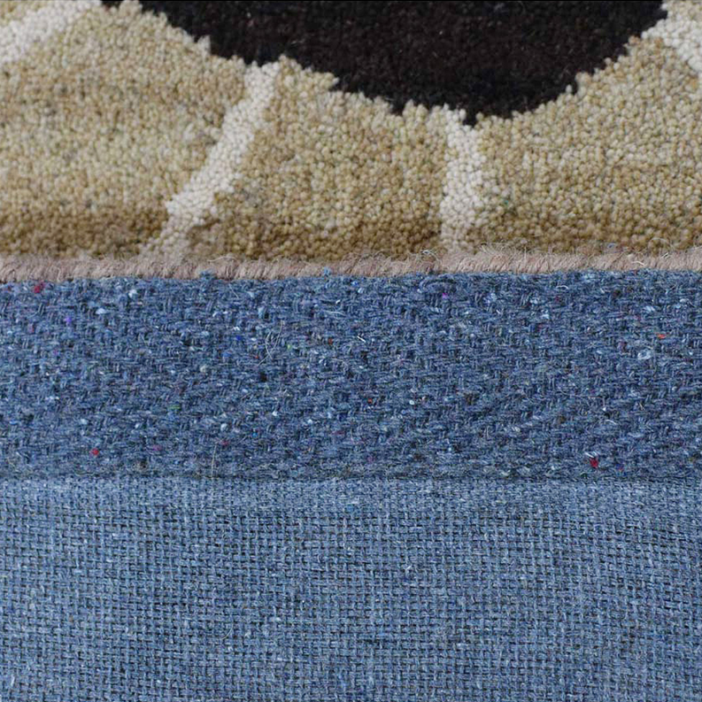 Blue and beige textured loop pile area rug with curved abstract pattern