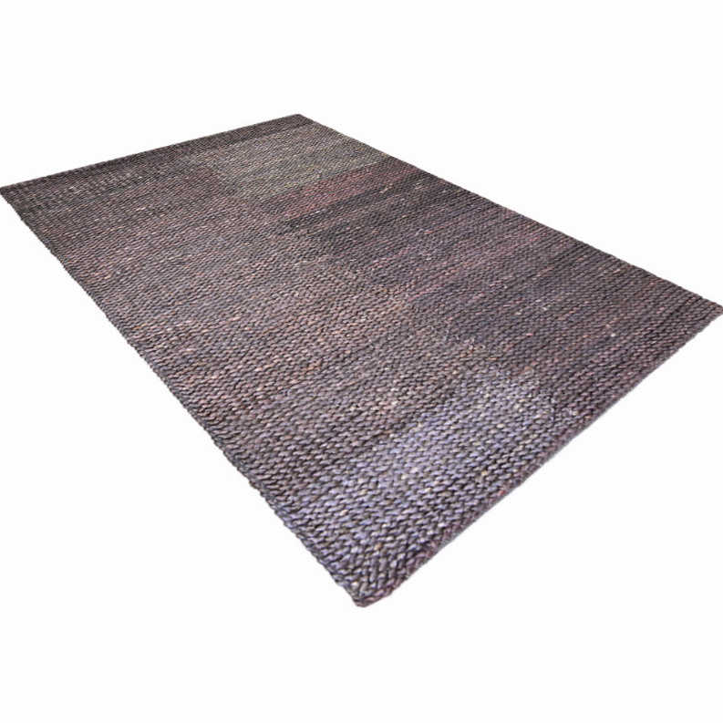 Solid jute area rug with flat handwoven surface in dark gray and faded rose tones