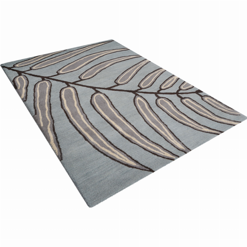 Hand-tufted wool area rug, blue-gray ground with beige elongated leaf shapes