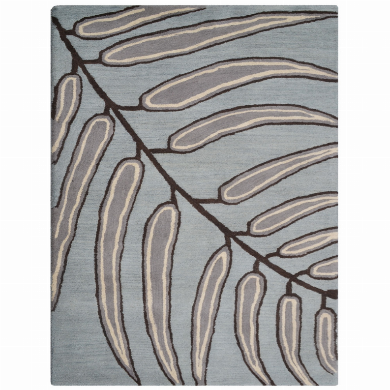 Hand-tufted wool area rug close-up, blue-gray with beige and dark brown leaf lines