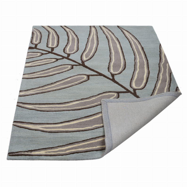 Hand-tufted wool area rug, light blue-gray with beige leaf motif and dark brown outline
