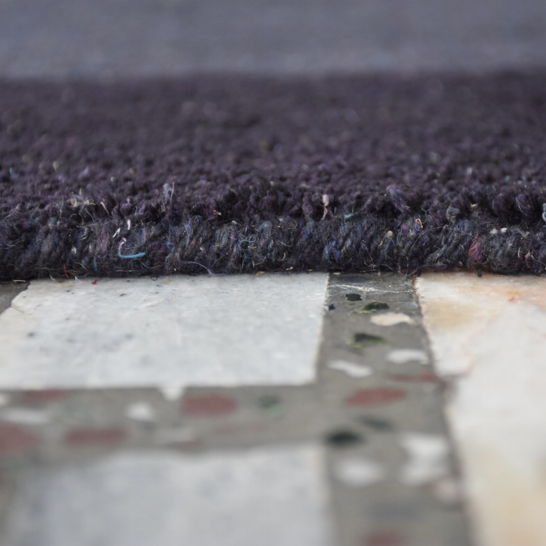 Hand-knotted silk mix area rug, dark navy-gray textured pile edge close-up