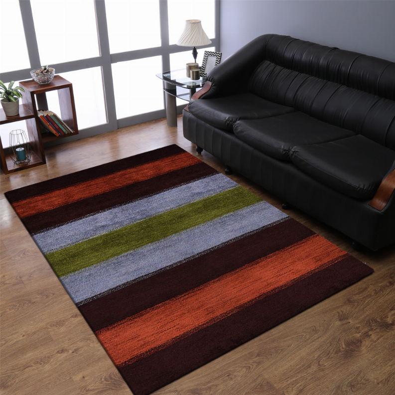 Multicolor striped area rug with dark brown, rust, olive green and gray bands in room