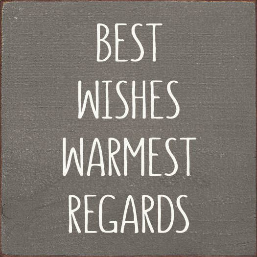 Grey wood sign with white hand-lettered "BEST WISHES WARMEST REGARDS"