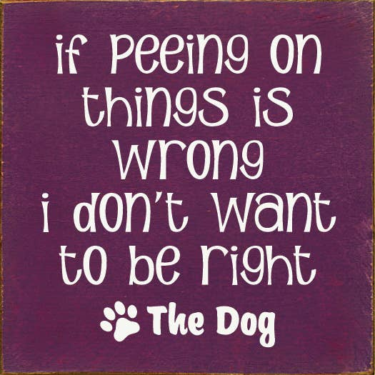 Purple rectangular sign with white slogan text and dog paw graphic